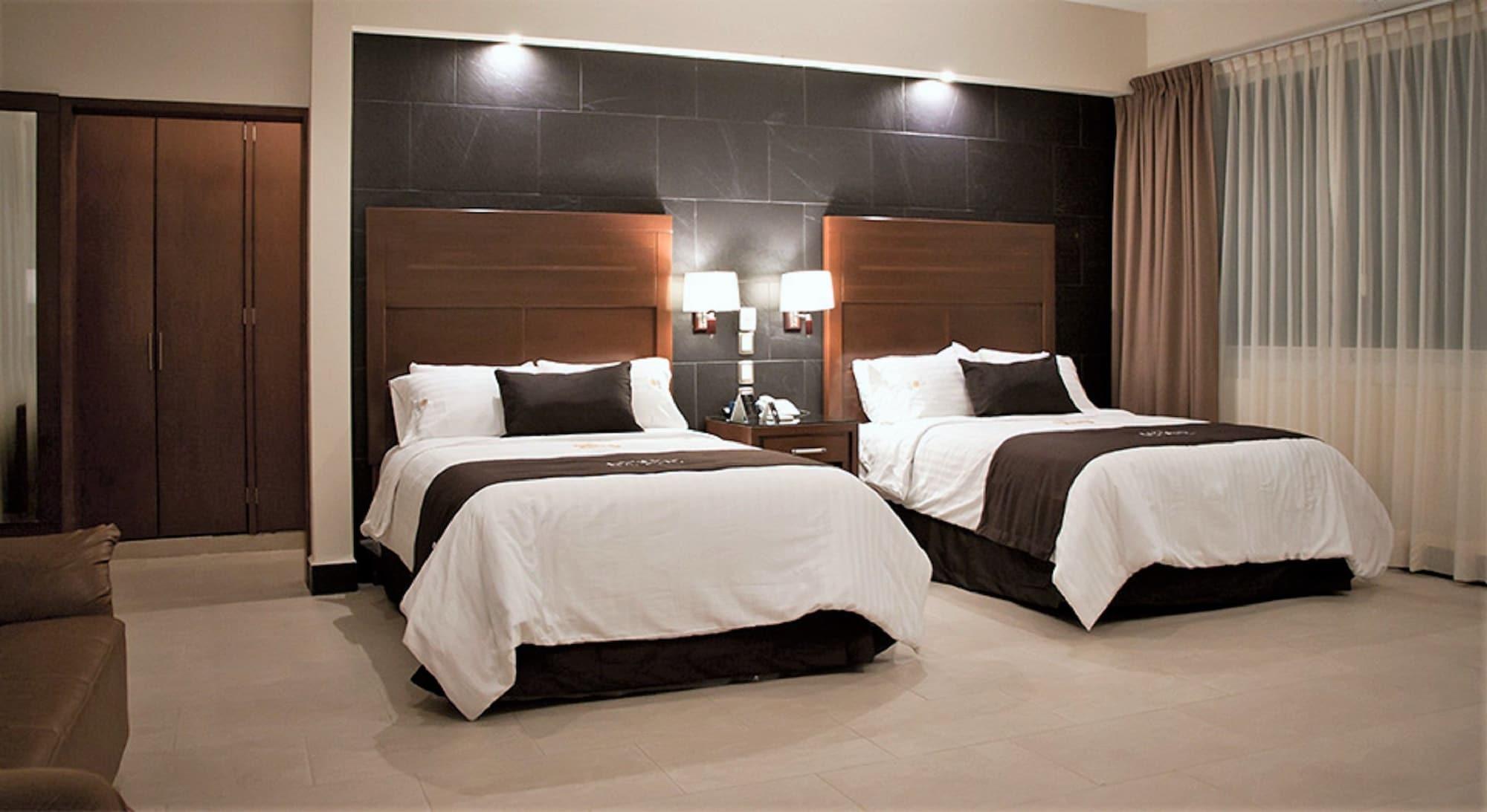 Hotel Ecce Inn&Spa Silao Exterior foto A typical hotel room