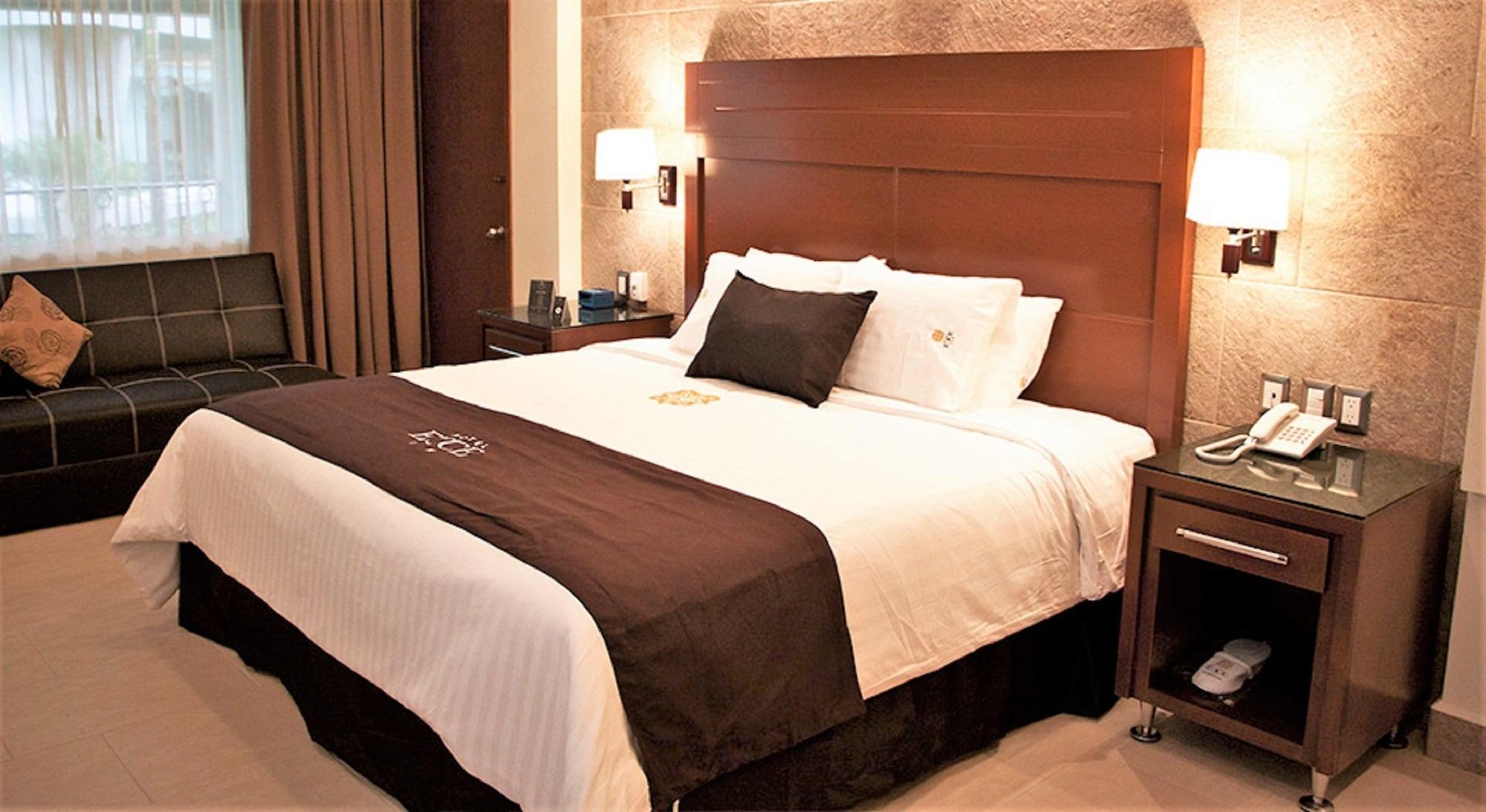 Hotel Ecce Inn&Spa Silao Exterior foto A bed