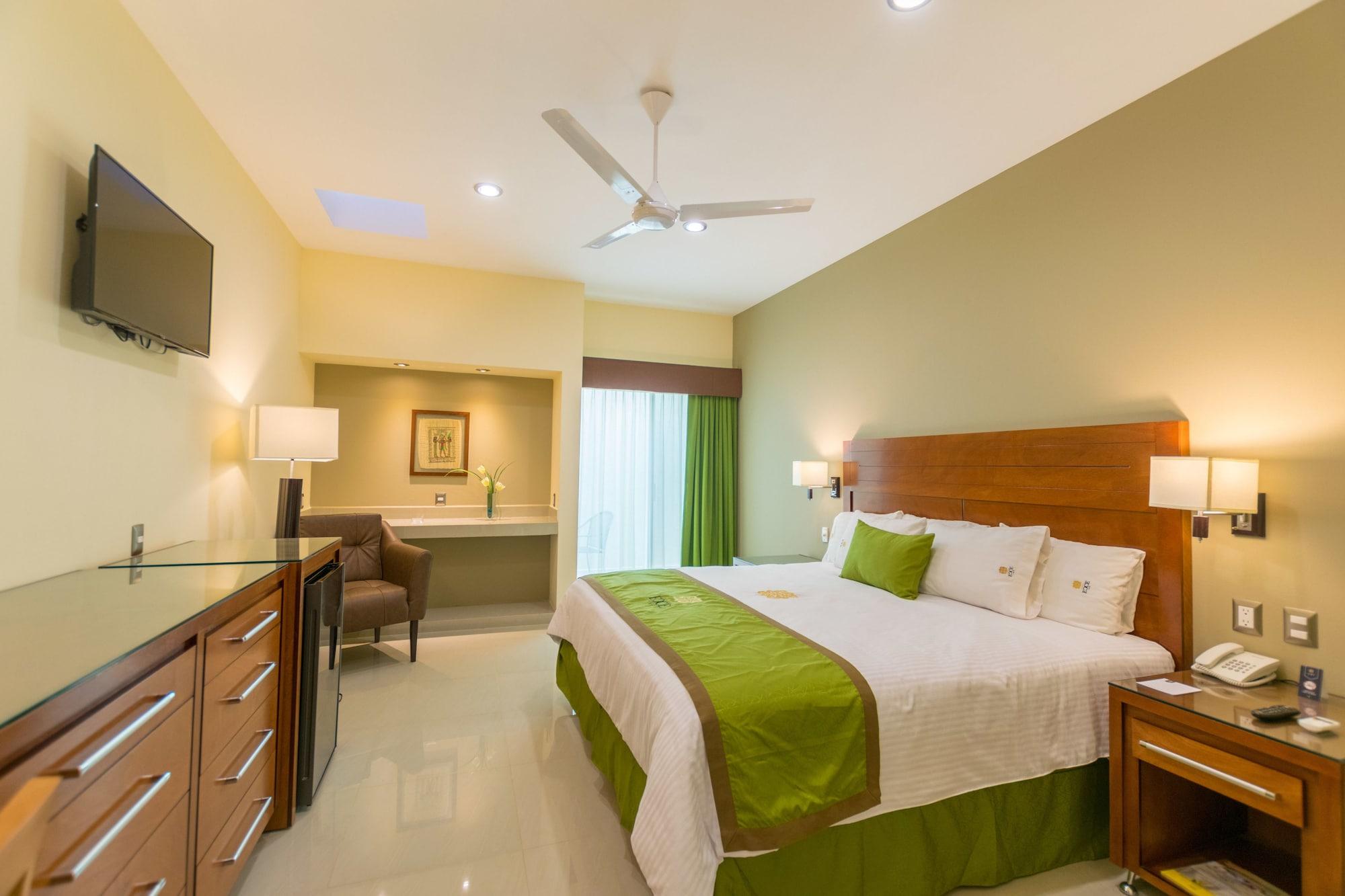 Hotel Ecce Inn&Spa Silao Exterior foto A bedroom at the hotel