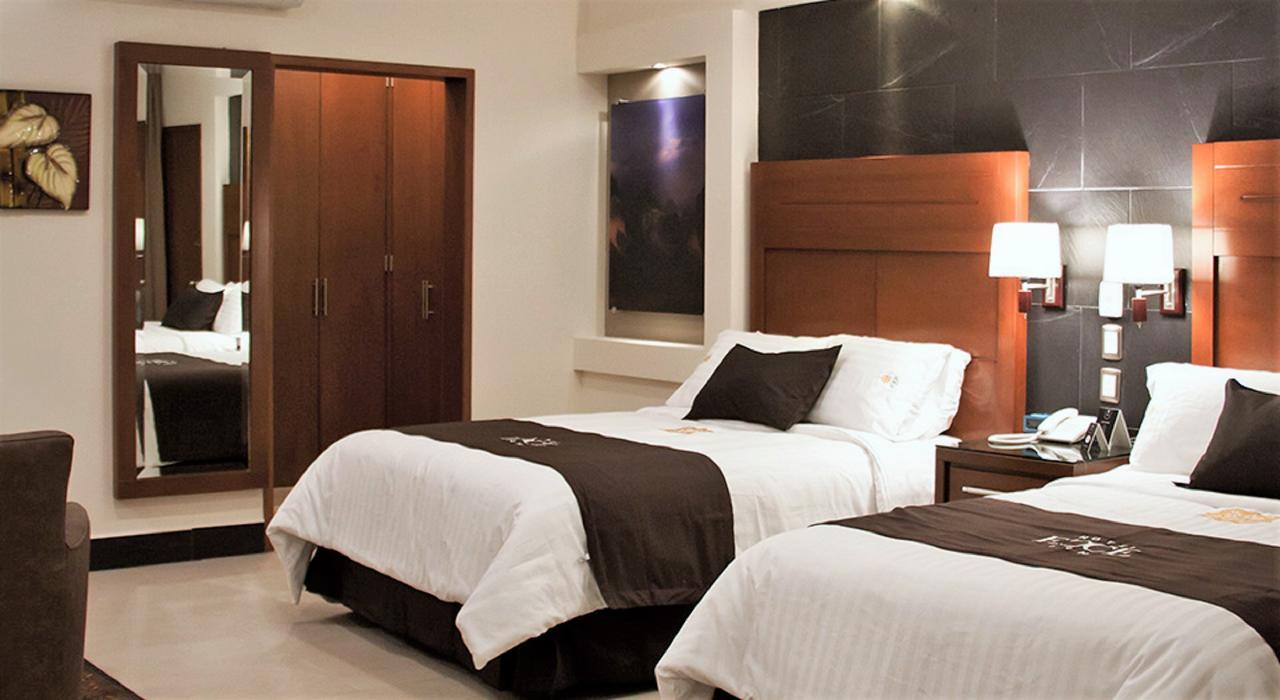 Hotel Ecce Inn&Spa Silao Exterior foto A room at the hotel